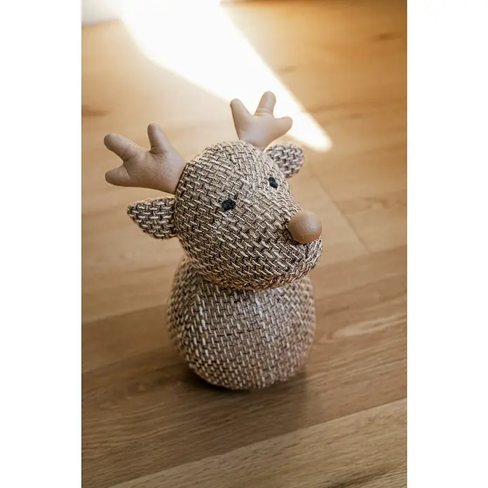 Türstopper Elch - 14 x 12 x 25 cm, Hellbraun - Figur eines Rentiers aus strukturiertem Webstoff mit brauner Nase und Geweih, auf hellem Holzboden im Sonnenlicht.