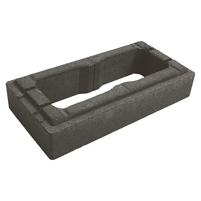 Christoph Mauerstein C-Line - Anthrazit, 50 x 25 x 10 cm, Beton - Das Foto zeigt einen rechteckigen, schwarzen Pflasterstein mit einem Loch in der Mitte. Er ist aus robustem Material und ideal für Gartenprojekte.