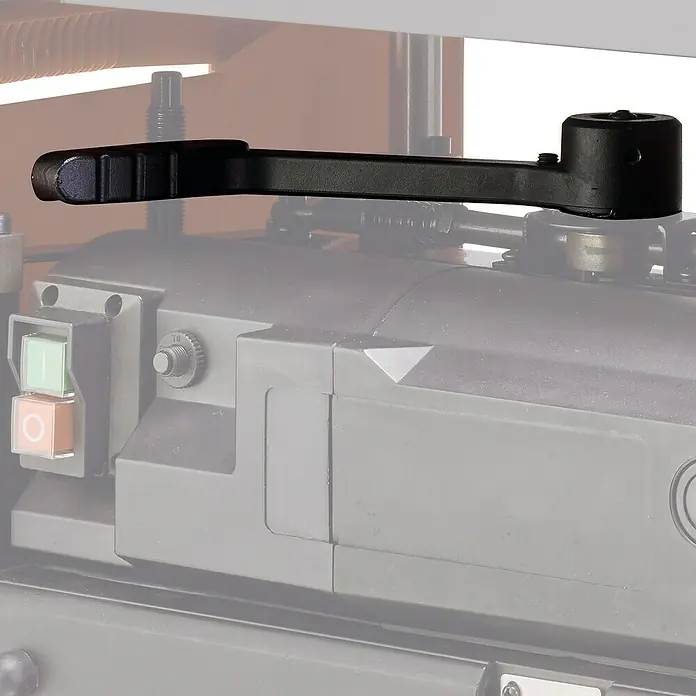 Einhell Expert Hobelmaschine TE-SP 330 - 1.800 W, Hobelbreite: 330 mm - Das Bild zeigt einen schwarzen Handgriff einer Hobelmaschine. Er dient zur Justierung und Einstellung der Maschine.