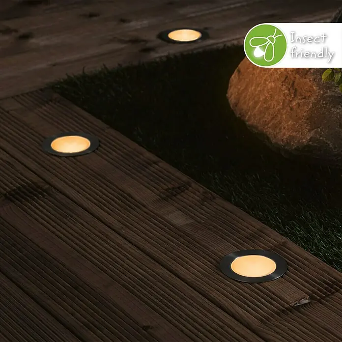 Paulmann Plug & Shine Bodeneinbauleuchte Floor Mini insektenfreundlich - 4,5 cm, Bernstein, IP67, Anthrazit - Insektenfreundliche LED-Deckleuchten mit warmem Licht und Edelstahlrahmen, in dunklem Holzdeck eingelassen.
