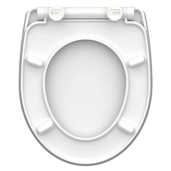 Schütte WC-Sitz Relaxing Frog - Duroplast, Grau/Gold, Mit Absenkautomatik - Nahaufnahme eines weißen Toilettensitzes mit Deckel, der ein sauberes und minimalistisches Design aufweist.