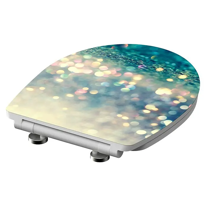 Schütte WC-Sitz Magic Light - Duroplast, Bunt, Mit Absenkautomatik - Funkelnder Toilettensitz mit einem schimmernden Bokeh-Design, das jedem Badezimmer einen Hauch von Glamour verleiht. Perfekt für ein stilvolles Ambiente.