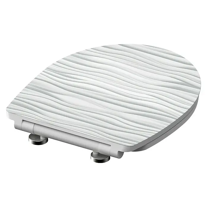 Schütte WC-Sitz White Wave - Duroplast, Weiß/Grau, Mit Absenkautomatik - Nahaufnahme eines stilvollen weißen WC-Sitzes mit wellenförmigem Design, der jedem Badezimmer einen Hauch von Eleganz verleiht.