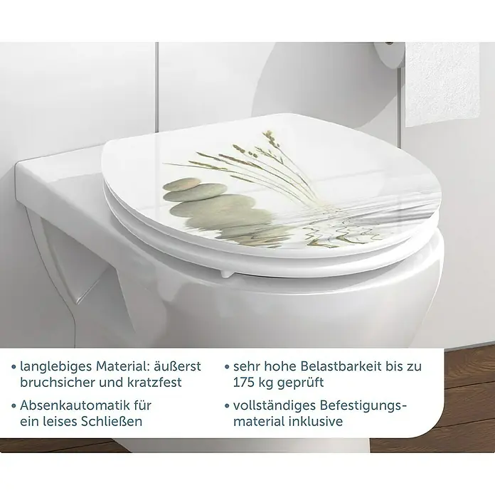 Schütte WC-Sitz Balance - MDF, Weiß/Beige, Mit Absenkautomatik - Nahaufnahme eines WC-Sitzes mit Steinen und Spiegelung. Das Material ist langlebig, bruchsicher und kratzfest bis 175 kg.
