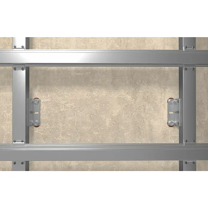 Fischer Langschaftdübel SXRL-FUS - Ø x L: 8 x 100 mm, Nylon, Stahl, 4 Stk. - Nahaufnahme eines Trockenbausystems mit Metallrahmen und Befestigungen vor einer beigen Wand.
