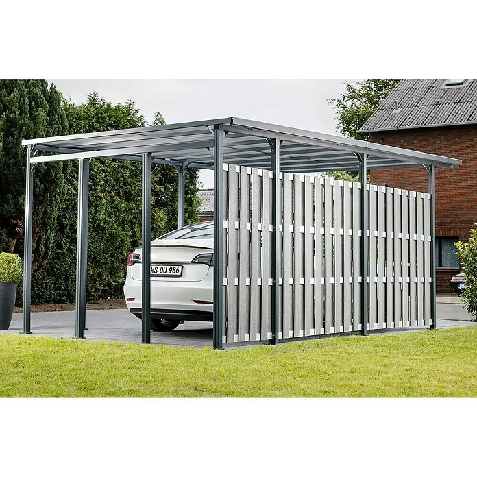 DWS Outdoor Carport Premium L - Außenmaß inkl. Dachüberstand (B x T): 3,31 x 5,41 m, Anthrazit, Carport geeignet für: PKWs - Graues Metall-Carport mit transluzentem Dach und grauer Lamellen-Seitenwand, schützt ein weißes Auto.