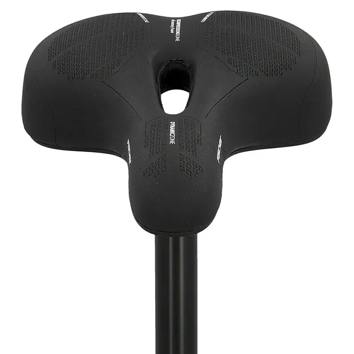Fischer R.E.Med. Fahrradsattel - Memory-Foam-Einlage, Geeignet für: Touren- & Cityräder - Nahaufnahme eines schwarzen Fahrradsattels mit Aussparung in der Mitte und Aufschrift "Dynamiczone".