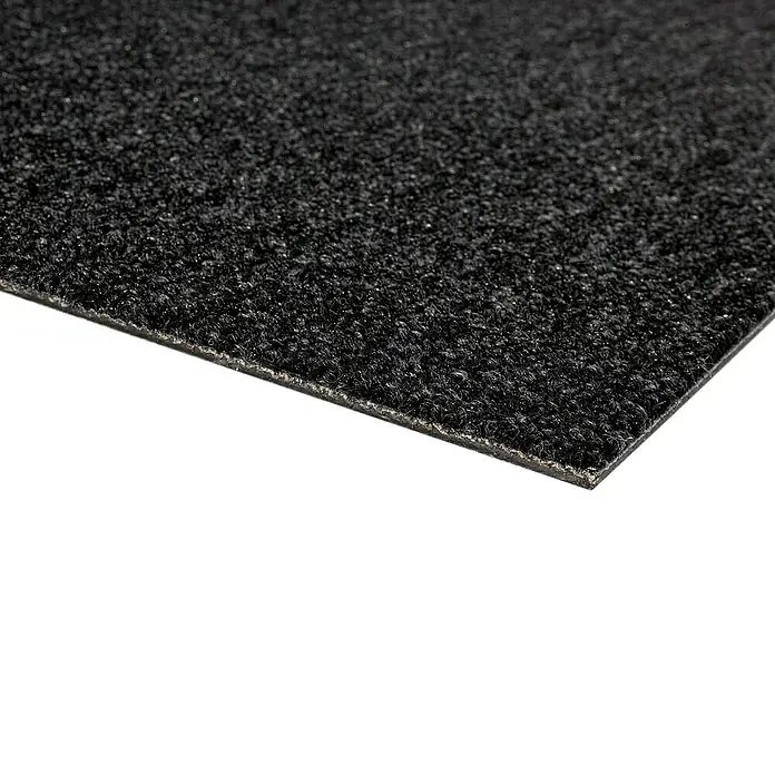 Teppichfliese Solid - Schlinge, 100 % Polyamid SDN, Anthrazit - Nahaufnahme einer schwarzen Antirutschmatte mit rauer Textur, ideal für sicheren Halt und zur Vermeidung von Unfällen.