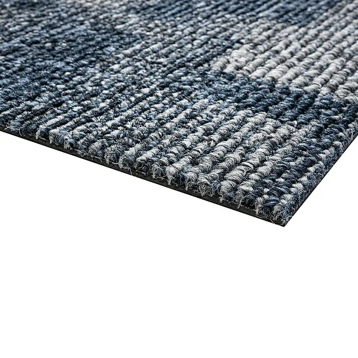 Teppichfliese Santo - 50 x 50 cm, Schlinge, 100 % Polypropylen, Dunkelblau - Nahaufnahme einer blau-grauen Fußmatte mit robuster Textur, ideal für Eingänge, um Schmutz aufzufangen und Böden sauber zu halten.