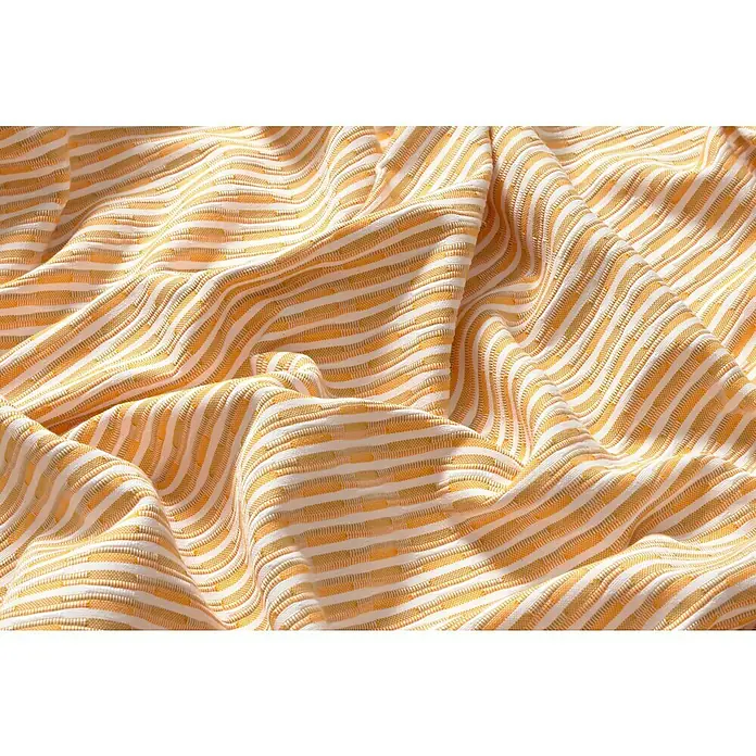 Manta para sofá Jacquard - Textil, Mostaza - Primer plano de tela de rayas naranjas y blancas.