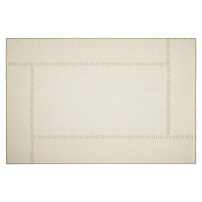 Alfombra exterior reversible In/Out Pespunte - Yute, 110 x 60 cm, Polipropileno - Una alfombra rectangular crema con un diseño de borde marrón sutil, perfecta para añadir un toque de elegancia discreta a cualquier habitación.