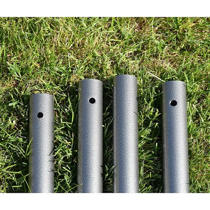 Kinderspielturm Thymek II - L x B x H: 230 x 150 x 195 cm, Hellgrün - Vier graue, pulverbechichtete Metallpfosten mit Löchern, die im Gras liegen. Die Pfosten sind für ein Zelt oder eine Struktur.