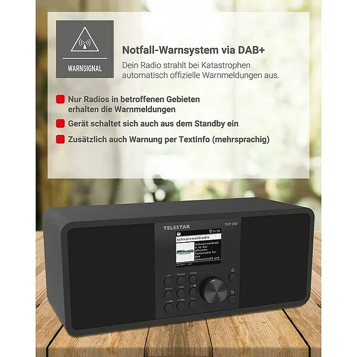 Telestar Internetradio Top 250 - L x B x H: 13 x 27,6 x 11,8 cm, Schwarz - Abbildung eines schwarzen Telestar TOP 250 DAB+ Radios mit Notfall-Warnsystem, das auf einem Holztisch steht.