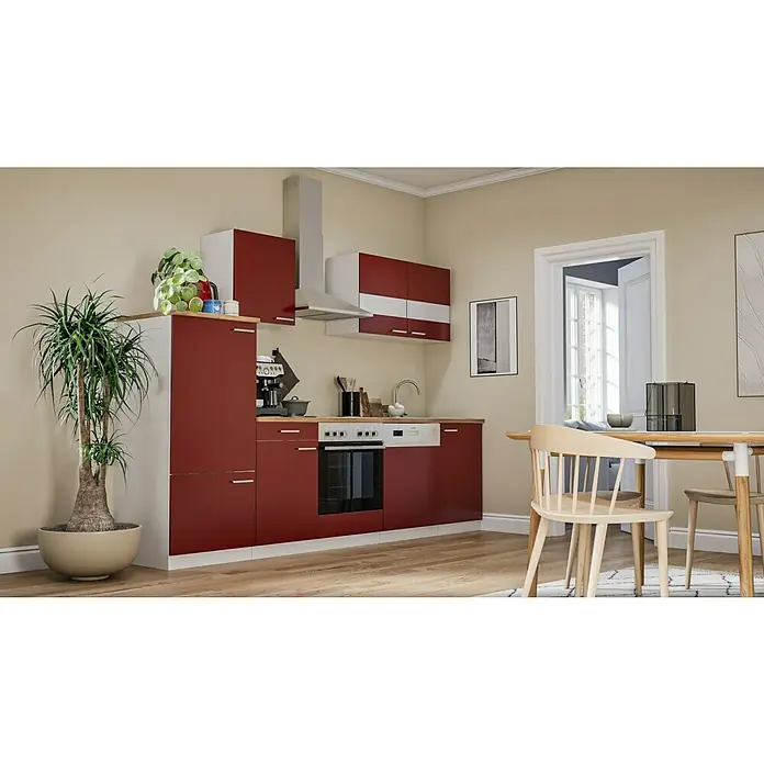 Respekta Küchenzeile Malia - Breite: 280 cm, Rot, Mit Elektrogeräten, Dekor Arbeitsplatte: Holzoptik, Volumen Backofen: 58 l - Eine moderne Küche in Rot und Weiß mit hellen Holzelementen, einer Dunstabzugshaube und einem Essbereich mit hellem Holztisch und Stühlen.