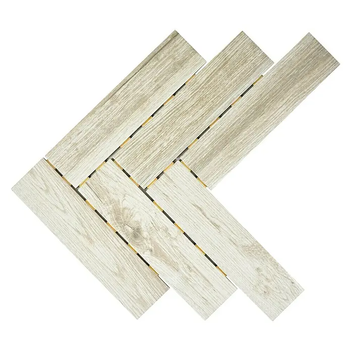 Mosaikfliese Fischgrät CDJ 17HB26,7 x 34,4 cm, Hellgrau, Matt - Das Bild zeigt stilvolle, helle Holzfliesen, die in einem Chevron-Muster angeordnet sind und eine moderne und natürliche Optik bieten. Ideal für Innenräume.