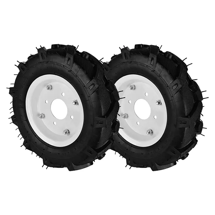 Könner & Söhnen Luftrad KS RW40 - 2 Stk., Passend für: Bodenhacke KS 7HP-950A, KS 7HP-950S, KS 7HP-1050G und KS 9HP-1350G-3 - Nahaufnahme von zwei Offroad-Reifen mit weißen Felgen, die für Traktoren oder ähnliche Nutzfahrzeuge geeignet sind.