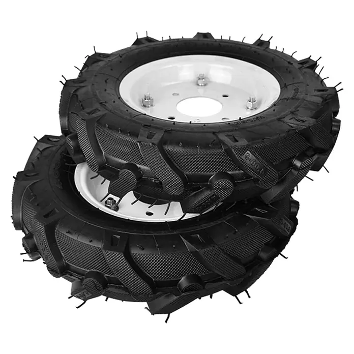 Könner & Söhnen Luftrad KS RW40 - 2 Stk., Passend für: Bodenhacke KS 7HP-950A, KS 7HP-950S, KS 7HP-1050G und KS 9HP-1350G-3 - Hier sind robuste Traktorreifen mit ausgeprägtem Profil und weißen Felgen für zuverlässige Leistung im Gelände.