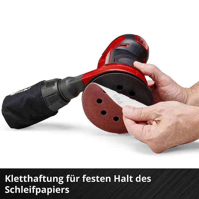 Einhell Power X-Change 18V Akku-Exzenterschleifer TE-RS 18 Li-Solo - 18 V, Ohne Akku, Durchmesser Schleifteller: 125 mm - Das Bild zeigt einen roten Exzenterschleifer mit Schleifpapier. Hervorgehoben wird die Kletthaftung für festen Halt des Schleifpapiers.