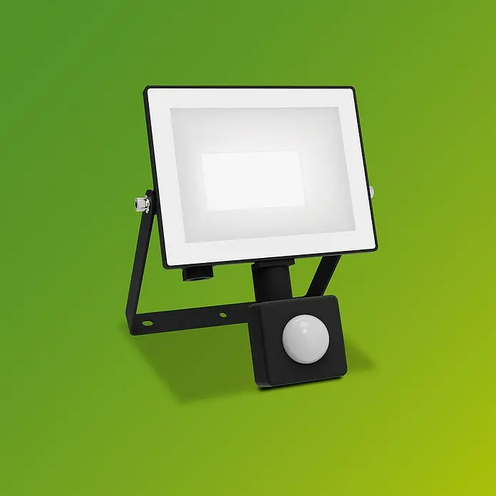 Philips Proyector LED con sensor Lois Flood - 20 W, Negro, L x An x Al: 6 x 16 x 13 cm, Blanco frío - Primer plano de un foco LED negro con sensor de movimiento sobre un fondo verde vibrante. El foco es brillante y moderno.