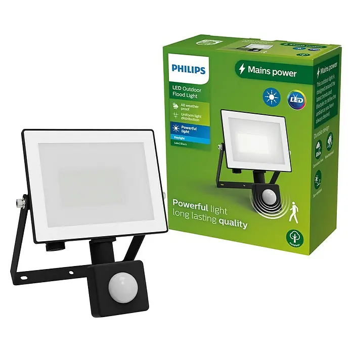 Philips Proyector LED con sensor Lois Flood - 20 W, Negro, L x An x Al: 6 x 16 x 13 cm, Blanco frío - La imagen muestra un foco LED exterior Philips junto con su embalaje, destacando una luz potente y una calidad duradera.