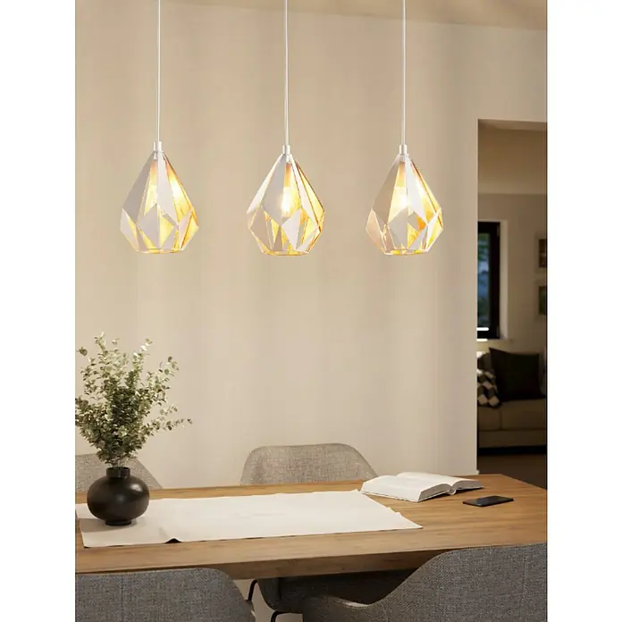 Eglo Carlton 1 Lámpara colgante - 180 W, L x An x Al: 80,5 x 20,5 x 110 cm, Blanco, Blanco, E27 - Lámpara colgante geométrica sobre una mesa de comedor con jarrón y libro.