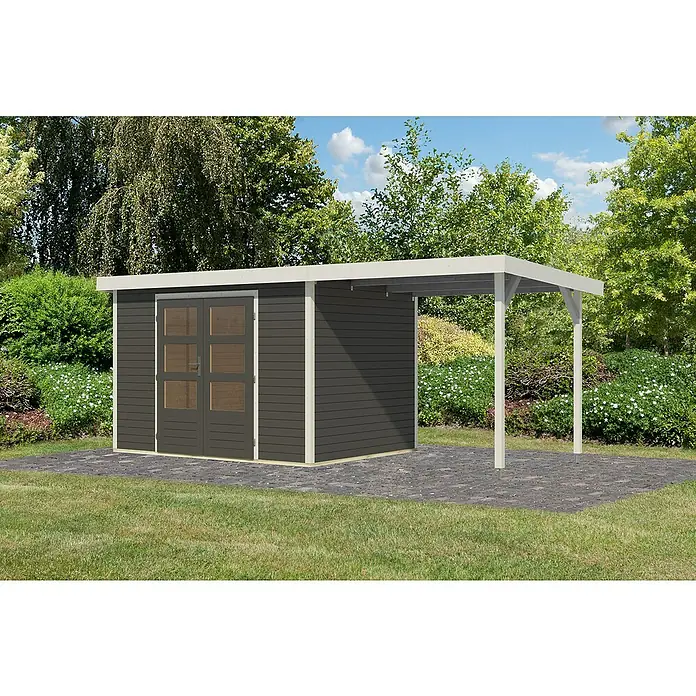 Karibu Gartenhaus Jupiter 4 B - Außenmaß inkl. Dachüberstand (B x T): 541,5 x 236,5 cm, Holz, Terragrau/Weiß, Mit Seitendach - Ein modernes Gartenhaus mit grauer Holzverkleidung und weißem Rahmen. Ein Carport ist angebaut und bietet zusätzlichen Stauraum oder einen Unterstand.