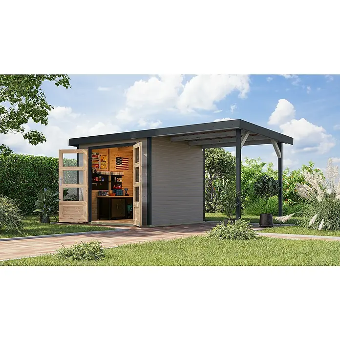Karibu Gartenhaus Jupiter 3 D - Außenmaß inkl. Dachüberstand (B x T): 486,5 x 236,5 cm, Holz, Wassergrau/Anthrazit - Holzgartenhaus mit offenem Anbau und doppelter Tür in einem grünen Garten mit verschiedenen Pflanzen.
