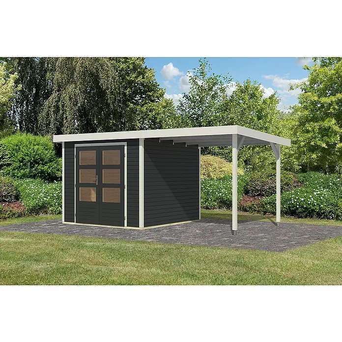 Karibu Gartenhaus Jupiter 3,5 C - Außenmaß inkl. Dachüberstand (B x T): 486,5 x 266,5 cm, Holz, Anthrazit/Weiß, Mit Seitendach - Ein modernes Gartenhaus mit integriertem Carport aus dunklem Holz mit hellen Akzenten auf einer gepflasterten Fläche.