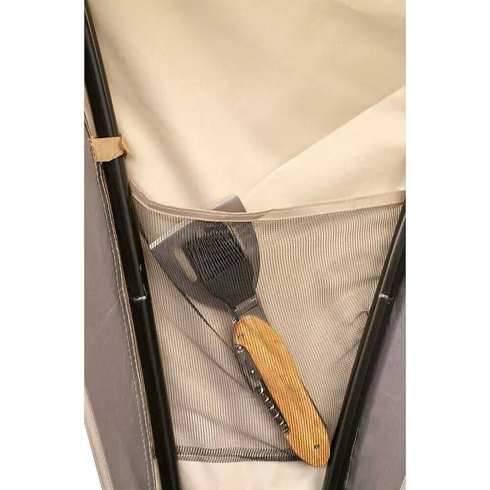 Bo-Camp Partyzelt - L x B x H: 370 x 370 x 239 cm, Beige, Stahl/Polyester - Nahaufnahme eines Grillspatels mit Holzgriff in einer Netztasche, der Funktionalität und Komfort für Grillbegeisterte vereint.