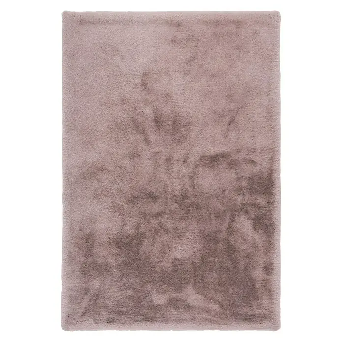 Fellteppich Happy - Rosa, 170 x 120 cm, 100 % Polyester (Flor) - Nahaufnahme eines rosa Teppichs mit weicher Textur. Der Teppich hat eine einheitliche Farbe mit subtilen Schattierungen.