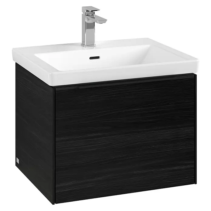 Villeroy & Boch Subway 3.0 Waschbeckenunterschrank - Black Oak, Anzahl Schubladen: 1 Stk., Farbe Griff: Volcano Black, B x T x H: 57,2 x 47,8 x 42,9 cm, Mit Beleuchtung - Ein elegantes Badezimmermöbel mit einem dunklen Holzunterschrank und einem weißen Waschbecken mit Armatur.