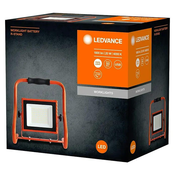 Ledvance LED-Baustrahler R-Stand - 20 W, 1.800 lm, 4.000 K, 266 x 200 x 276 mm, IP44 - LEDVANCE Arbeitsleuchte in Orange und Schwarz, mit Ständer und Griff, auf ihrer schwarz-orangen Produktverpackung.