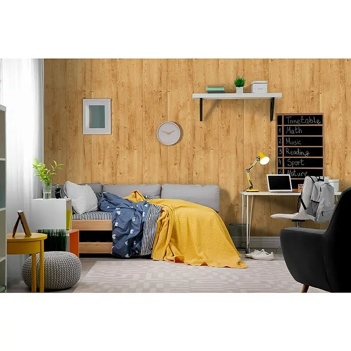 Bariperfil Panel de pared Roble Auro - 260 x 25 cm, Roble - Una habitación luminosa y acogedora con una cama de madera, un escritorio con una lámpara y un sillón negro, creando un espacio cálido y funcional.
