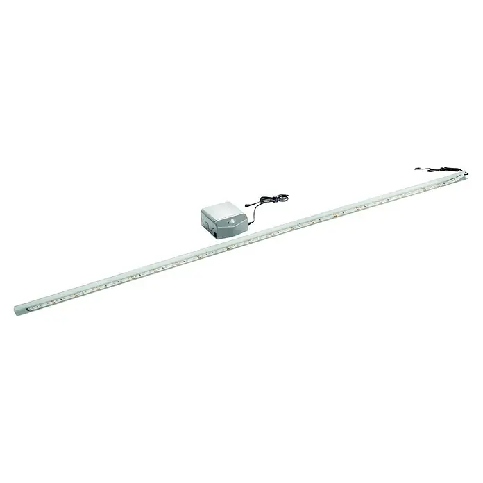 Fackelmann LED-Beleuchtung - 4,56 W, B x L: 1,5 x 99,9 cm - Bild einer langen, weißen LED-Leuchte mit Markierungen und einer grauen Anschlussbox, die auf einer hellen Oberfläche liegt.