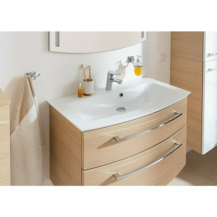 Fackelmann B.style Badmöbel-Set - Gesamtbreite Badmöbel: 83,2 cm, Sandeiche - Ein moderner Waschtisch mit einem weißen Waschbecken und Unterschrank in Holzoptik, der durch sein schlichtes Design besticht.