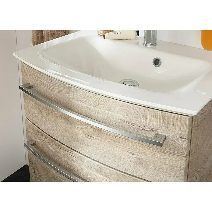 Fackelmann B.style Badmöbel-Set - Gesamtbreite Badmöbel: 63,2 cm, Nature Oak Holzoptik - Waschtischunterschrank mit hellen Holzfronten und langen, silbernen Griffen. Das Waschbecken ist aus weißer Keramik und fügt sich nahtlos ein.