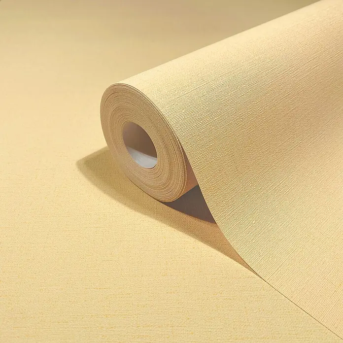 Glööckler Pompöös Provence Vliestapete - Gelb, Uni, 10,05 x 0,53 m - Eine Rolle hellgelber Tapete mit feiner Textur, ideal für eine warme und einladende Raumgestaltung.