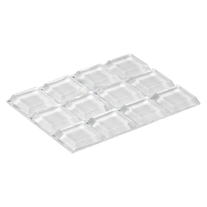 Inofix Adhesivo antideslizante 4054-2 - Transparente, Pegado, 12 pzs. - Almohadilla antideslizante rectangular transparente con doce pequeños cuadrados, ideal para asegurar muebles y proteger superficies de deslizamientos.