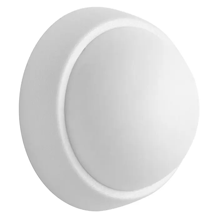 Inofix Tope de puerta 2450 - Plástico, Blanco - Primer plano de una lámpara de pared redonda blanca con acabado mate, ideal para interiores modernos e iluminación eficiente.