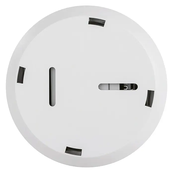 Homematic IP Bewegungsmelder HmIP-SPI - Batteriebetrieben, Ø x H: 10 x 2,9 cm, Bewegungssensorik, 105 ° - Nahaufnahme eines runden, weißen Rauchmelders mit Schlitzen für die Raucherkennung. Ein wichtiger Sicherheitsgegenstand für jedes Zuhause.