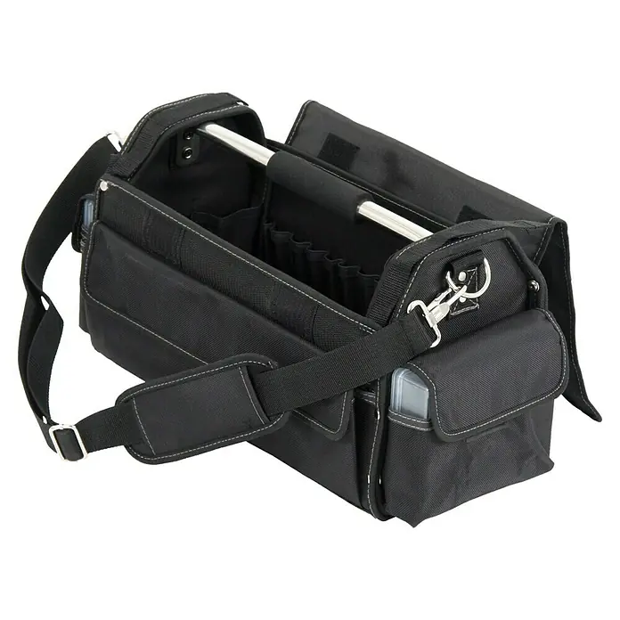 Hepco & Becker Werkzeugtasche Profi-Installateurtasche 5858 - L x B x H: 200 x 400 x 240 mm, Polyester - Eine offene, schwarze Werkzeugtasche mit Trageriemen und silberfarbenem Griff, ideal für Handwerker. Praktisch und robust.