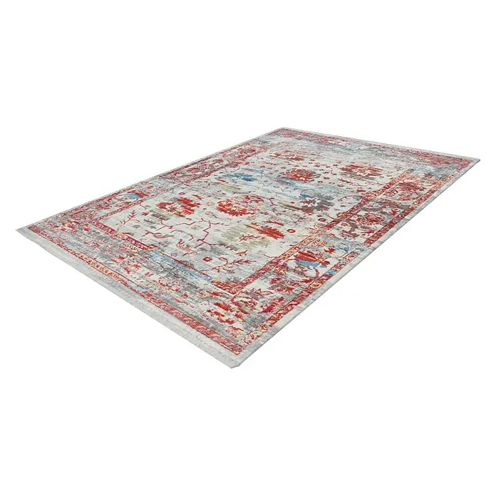 Kayoom Kurzflorteppich Antigua II - Bunt, 170 x 120 cm, 100 % Polyester - Ein detailreicher Teppich mit einem Muster in Rot, Blau und Grau auf einem hellen Untergrund. Perfekt, um jedem Raum Wärme und Stil zu verleihen.