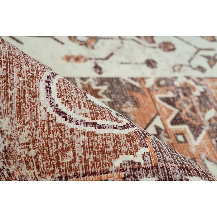 Kayoom Kurzflorteppich Indiana - Terra, 150 x 80 cm, 100 % Baumwolle - Detailaufnahme eines gemusterten Teppichs mit orientalischen Motiven in warmen Braun- und Beigetönen, der eine gemütliche Atmosphäre verspricht.
