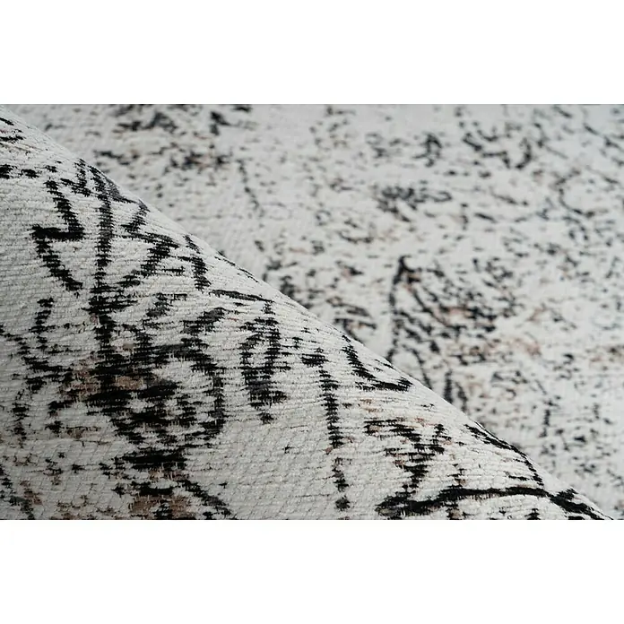 Kayoom Kurzflorteppich Iglesia - Anthrazit, 150 x 80 cm, 100 % Polyester - Detailaufnahme eines stilvollen Teppichs mit abstraktem Muster in neutralen Farben, der eine elegante und moderne Note verleiht.