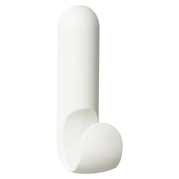 Inofix Colgador adhesivo Atlas - Blanco, 1 ud. - Primer plano de un gancho de pared de plástico blanco con formas redondeadas sobre un fondo negro. Almacenamiento práctico.