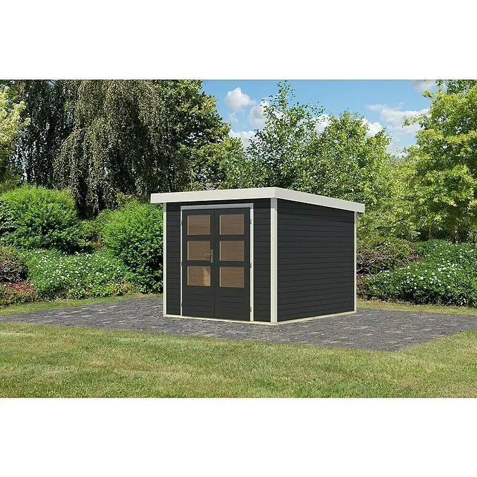 Karibu Gartenhaus Jupiter 3,5 C - Außenmaß inkl. Dachüberstand (B x T): 266 x 266,5 cm, Holz, Anthrazit/Weiß - Außenaufnahme eines modernen, dunkelgrauen Gartenhauses mit Doppeltür und weißen Akzenten, das auf einem gepflasterten Bereich in einem Garten steht.