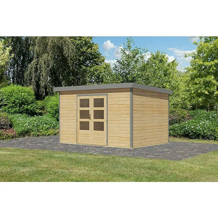 Karibu Gartenhaus Pluto 7 A - Außenmaß inkl. Dachüberstand (B x T): 390 x 273 cm, Holz, Naturbelassen/Grau - Eine moderne Holzgartenlaube mit Flachdach und Doppeltür auf einer gepflasterten Fläche, umgeben von Grün.