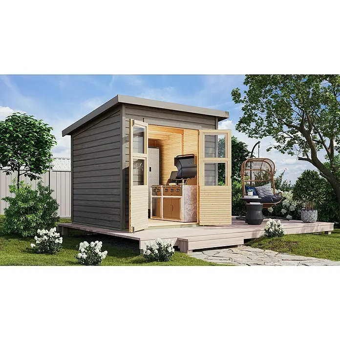 Karibu Gartenhaus Merseburg 4 - Außenmaß inkl. Dachüberstand (B x T): 240 x 236 cm, Holz, Vorvergraut, Ohne Seitendach - Eine moderne Gartenhütte mit Grill und Hängesessel auf einer Holzterrasse, umgeben von Grünpflanzen und Blumen, präsentiert einen stilvollen Außenbereich.