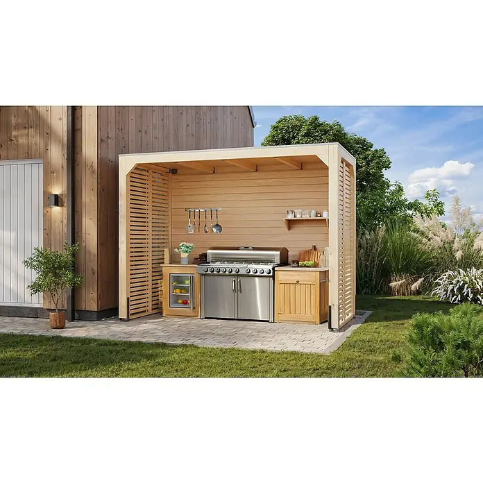 Karibu Grillpavillon - B x T: 320 x 160 cm, Farbe Gestell: Naturbraun, Holz - Bild einer modernen Outdoor-Küche mit Grill und Holzelementen, eingebettet in eine grüne Gartenlandschaft. Die Küche ist mit Edelstahlgeräten ausgestattet.