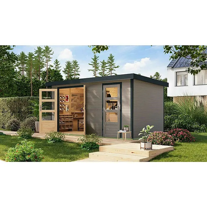 Karibu Gartenhaus Merkur D - Außenmaß inkl. Dachüberstand (B x T): 431,5 x 235 cm, Holz, Wassergrau/Anthrazit - Moderne Gartenlaube mit einer Werkbank im Innenraum und Werkzeug an der Wand. Die Tür ist offen und gibt den Blick ins Innere frei.